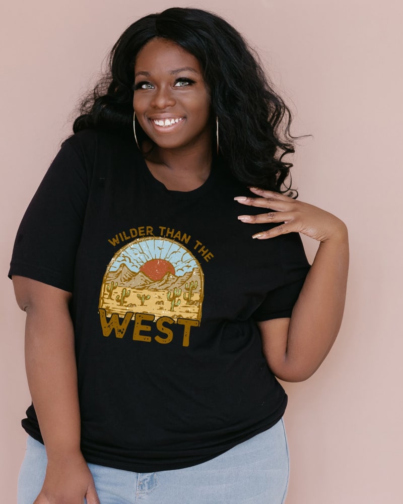 Front of a model wearing a size 2XL Wilder Than The West in Black by Simply Sage Market. | dia_product_style_image_id:281346